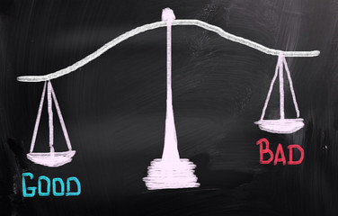 Scales representing morality, good weighted against bad